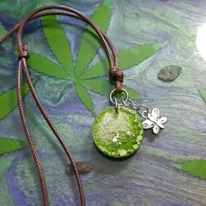 Green butterfly pendant